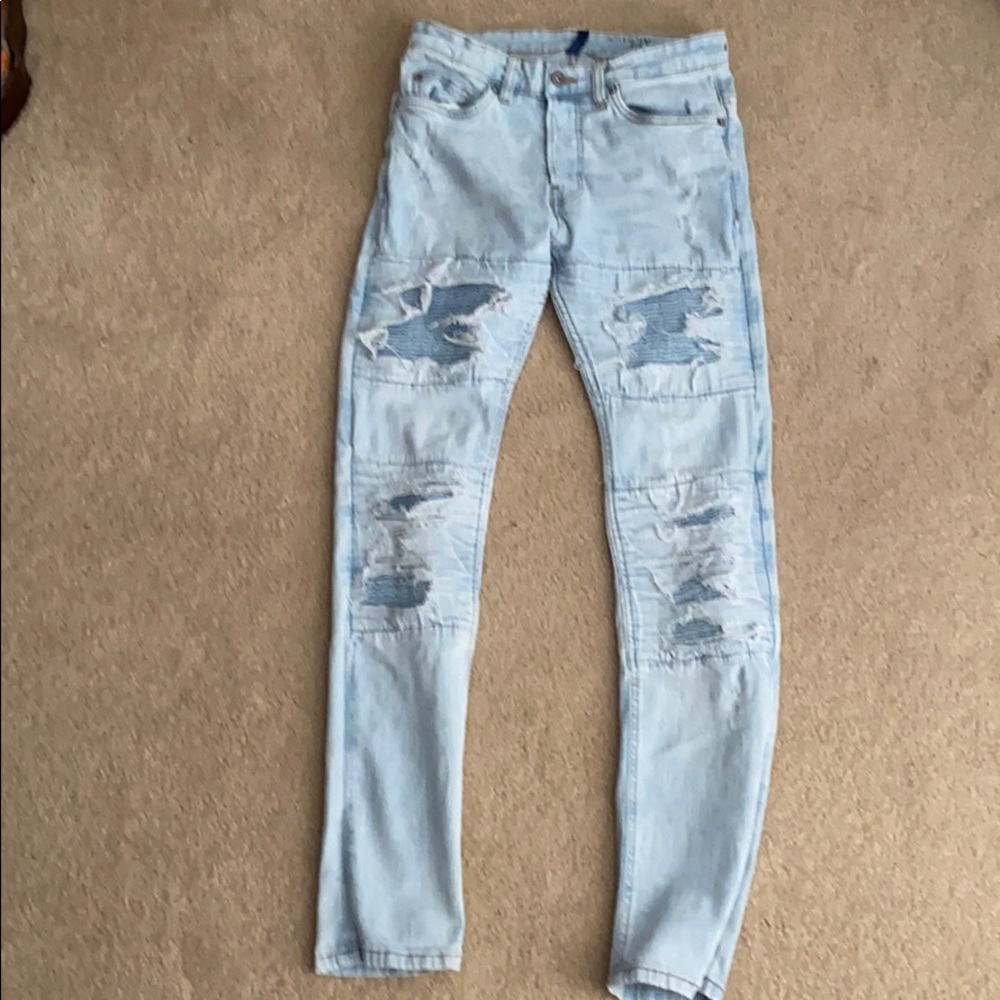 light blue ripped jeans